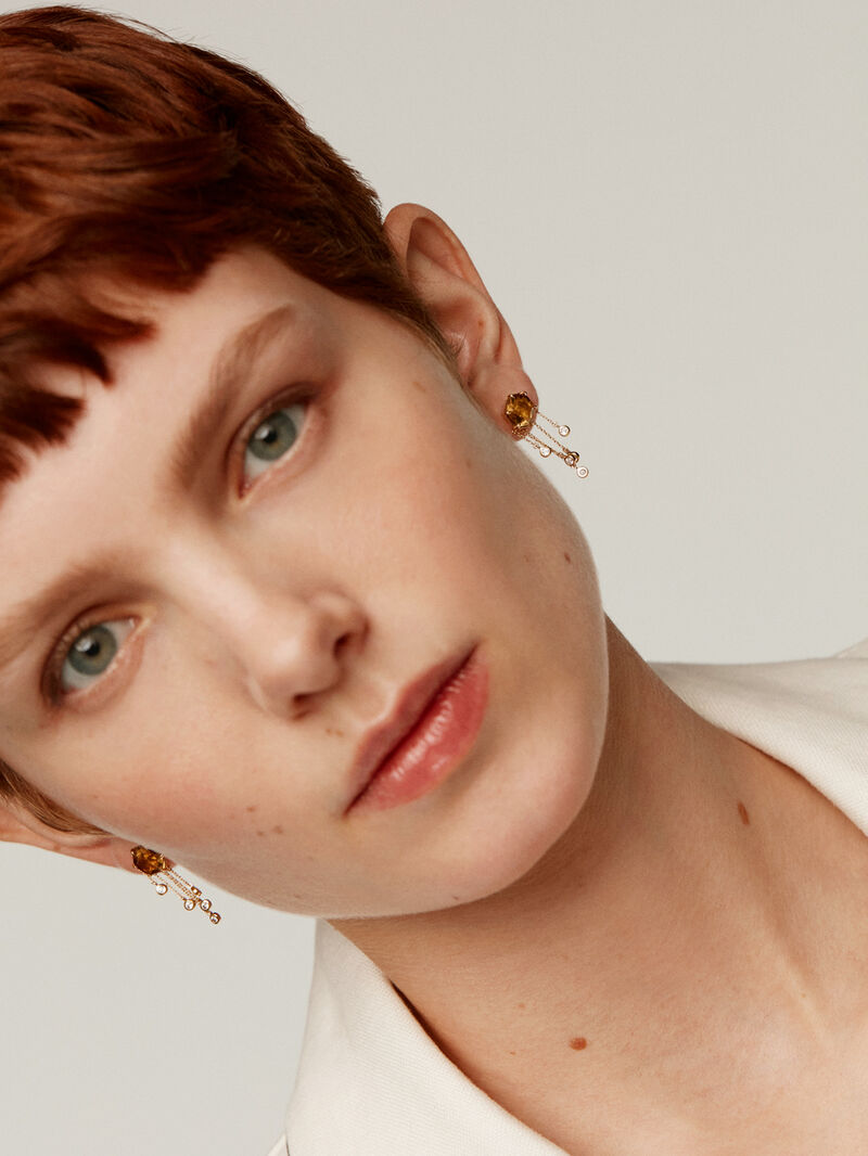 Long earrings made of 925 silver, plated with 18K yellow gold and adorned with brown quartz and white topaz. image number 1