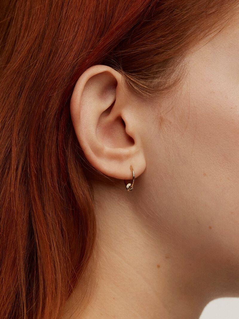 Individual 9K yellow gold hoop earring with a small ball. image number 1