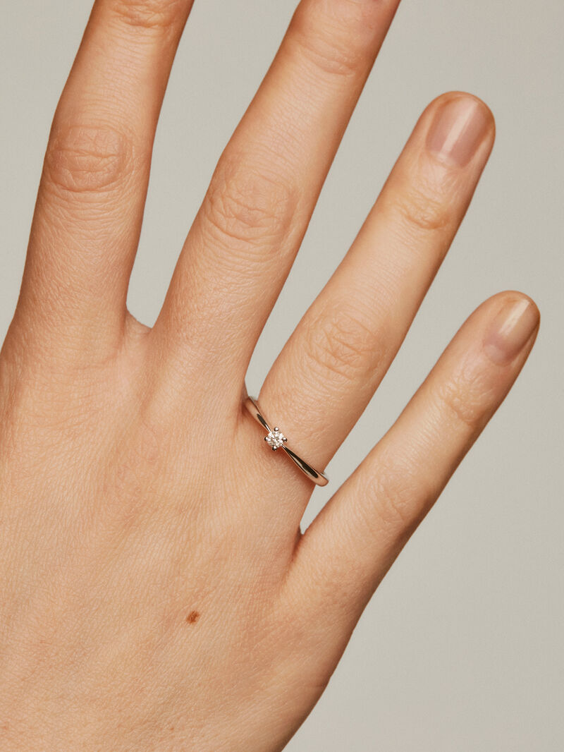 18K White Gold Solitaire Ring with a 0.08 cts Diamond. image number 1