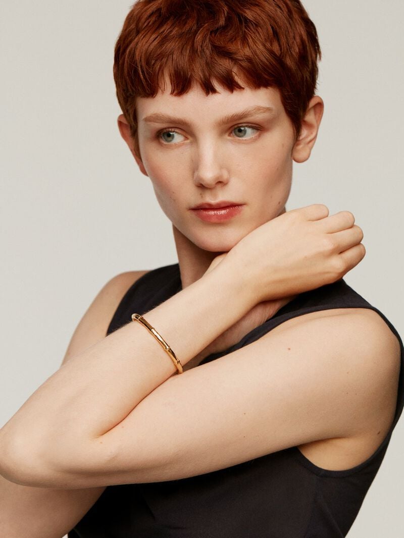Bangle bracelet made of 925 silver, plated in 18K yellow gold with a bamboo texture. image number 1