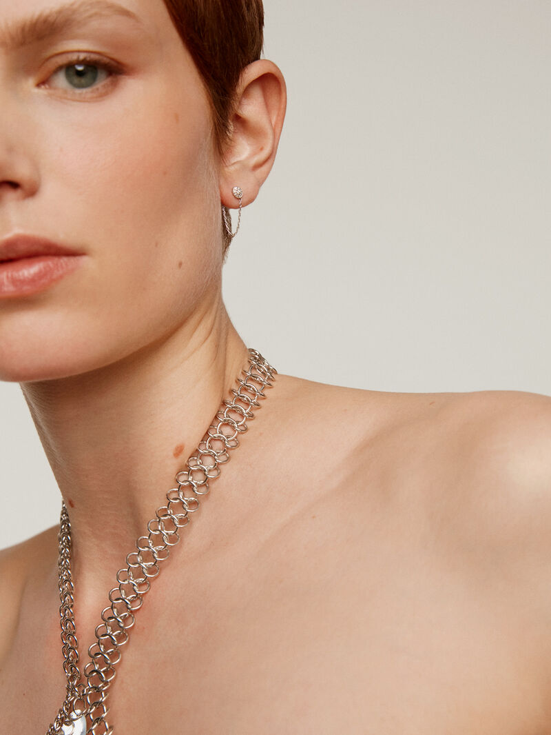 Individual 18K white gold earring with chain and diamonds. image number 1