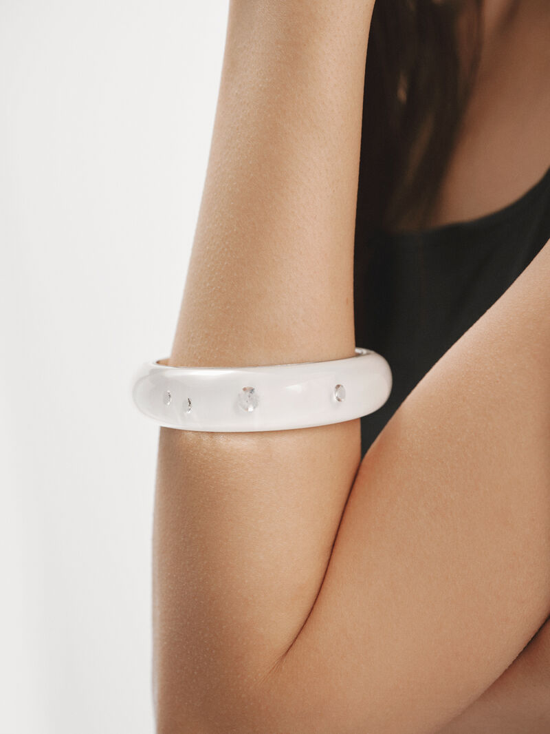 Rigid 925 silver bracelet with white enamel and zircons suspended in resin image number 1