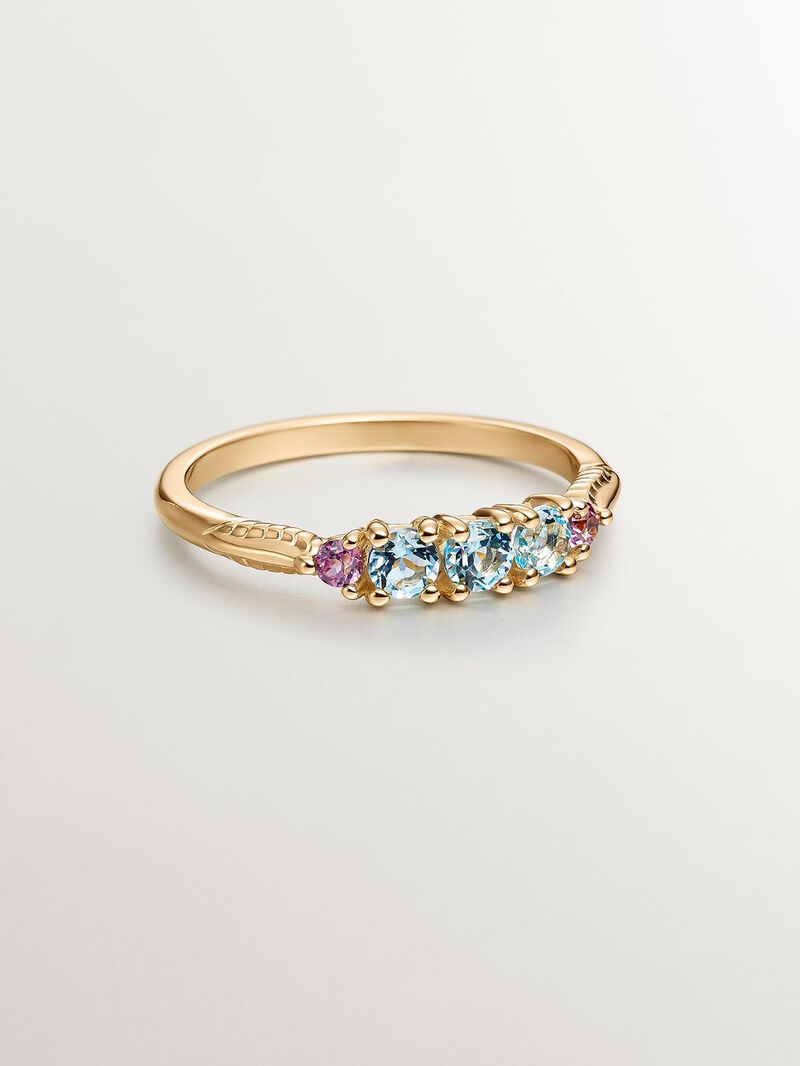925 Silver ring bathed in 18K yellow gold with topaz and rhodolites. image number 2
