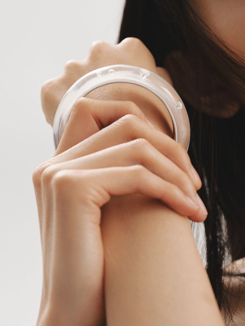 Rigid 925 silver bracelet with white enamel and zircons suspended in resin image number 5