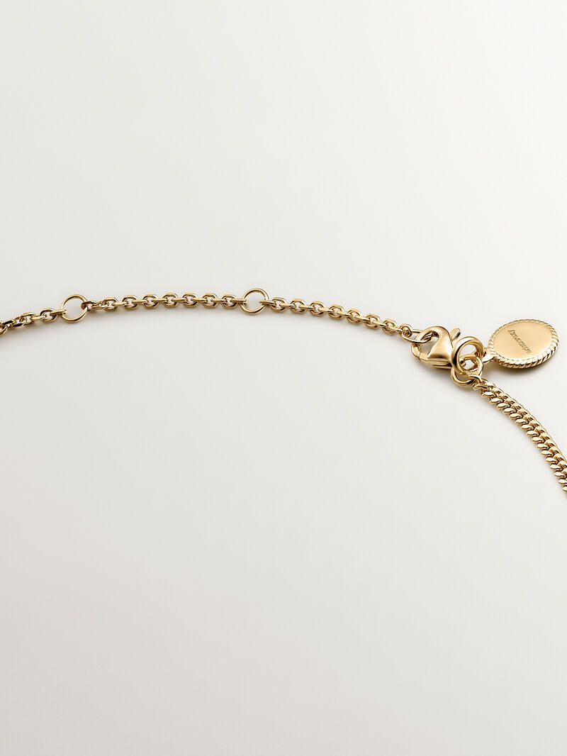 925 Silver pendant bathed in 18K yellow gold with pink rhodolite, London blue topaz, and green peridot. image number 6