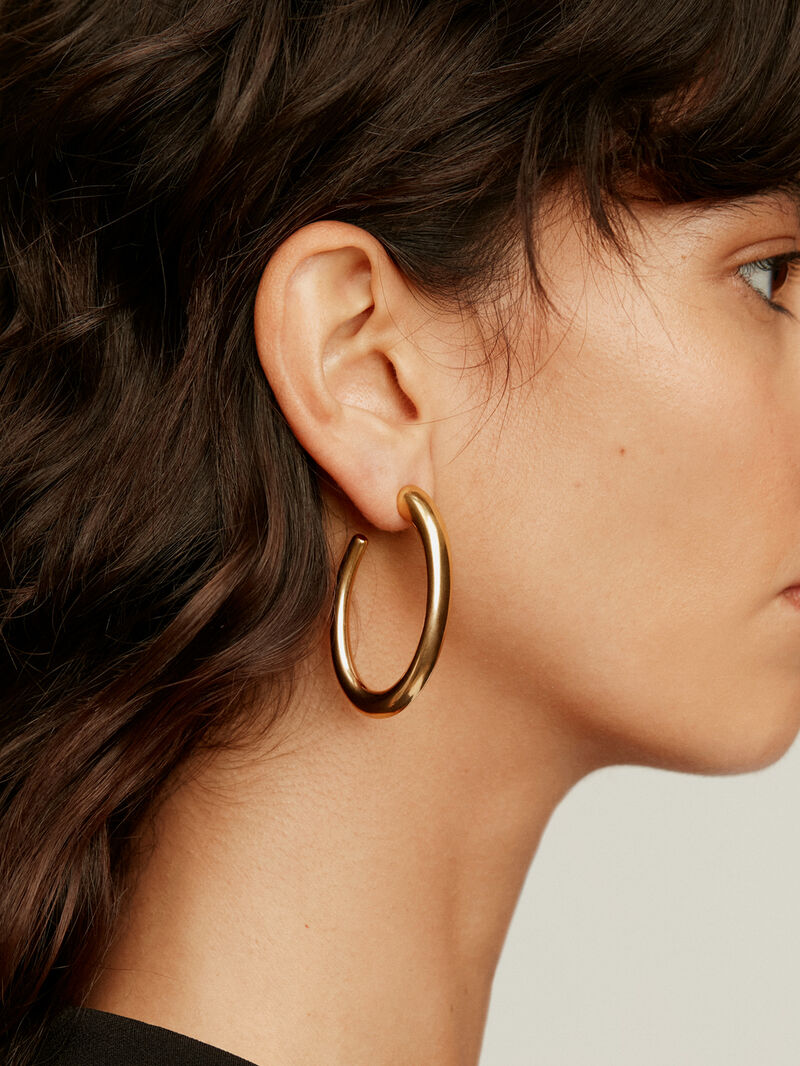 Large hoop earrings made of 925 silver, coated in 18K yellow gold, with an oval shape. image number 1