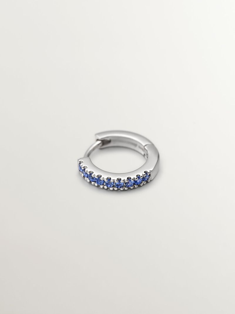 Individual 9K white gold hoop earring with blue sapphires. image number 2