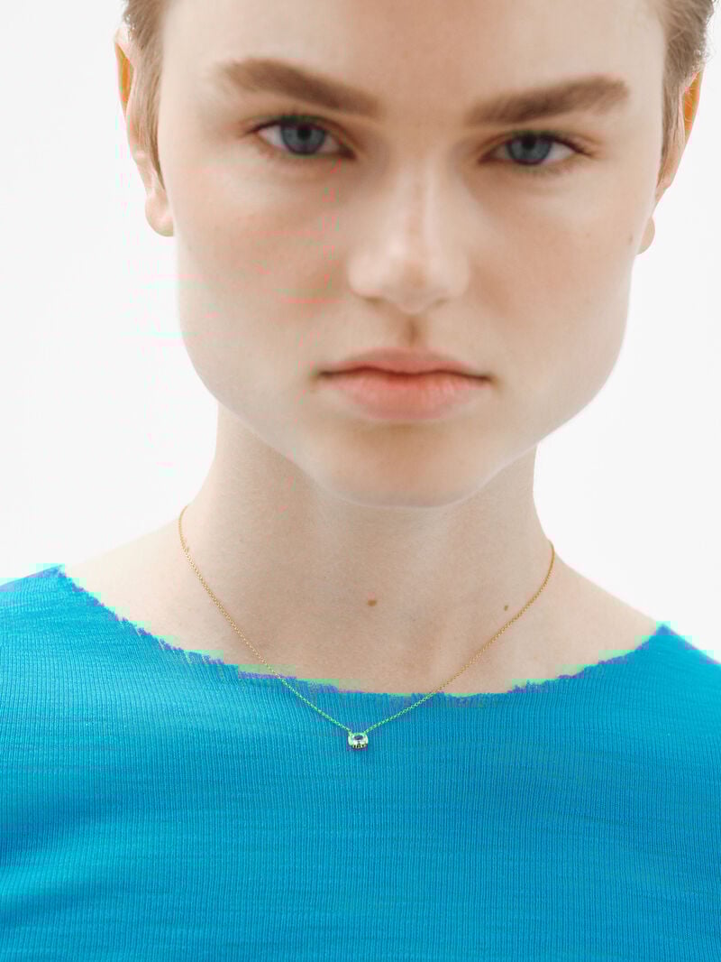 925 Silver pendant bathed in 18K yellow gold with sky blue topaz. image number 3