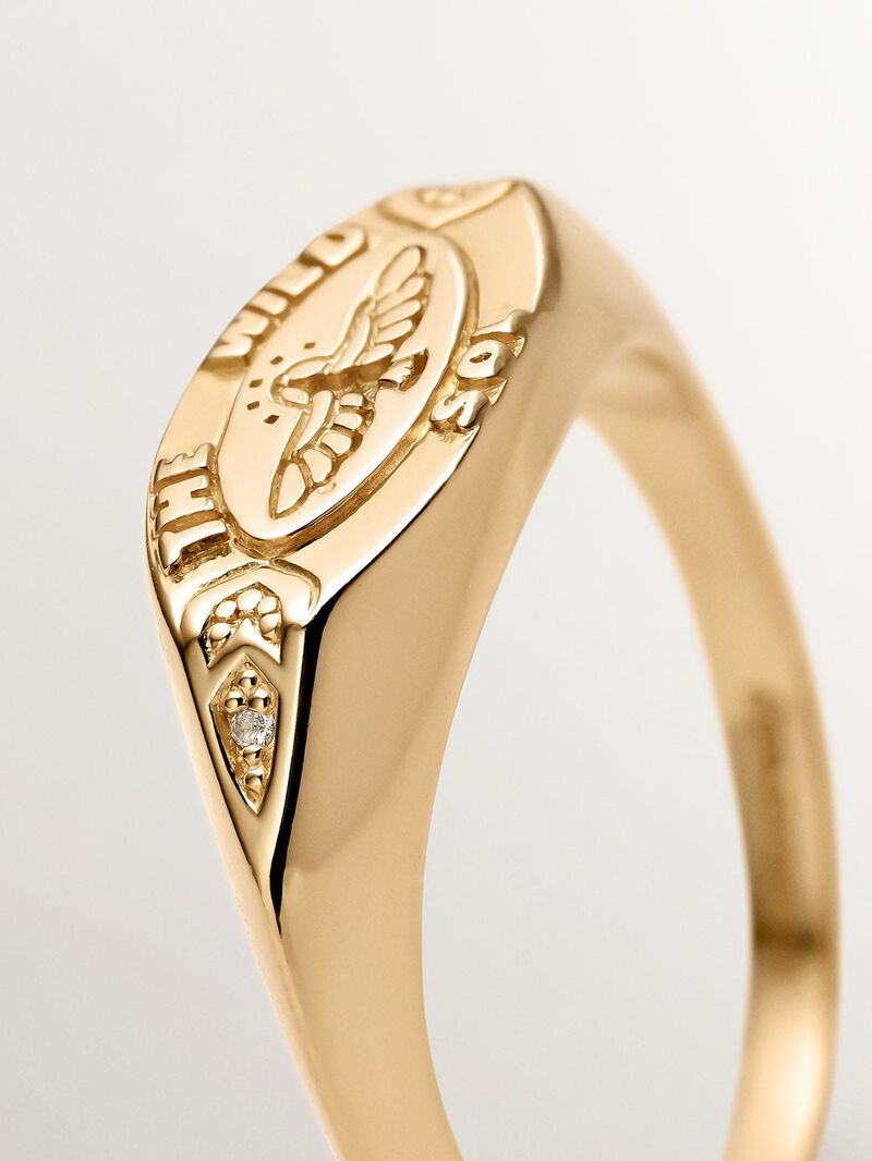 925 Silver seal ring bathed in 18K yellow gold with white topaz and eagle. image number 2