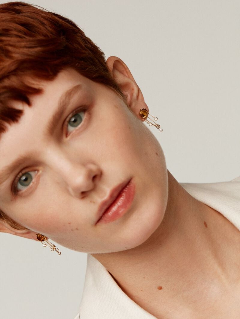 Long earrings made of 925 silver, plated with 18K yellow gold and adorned with brown quartz and white topaz. image number 1