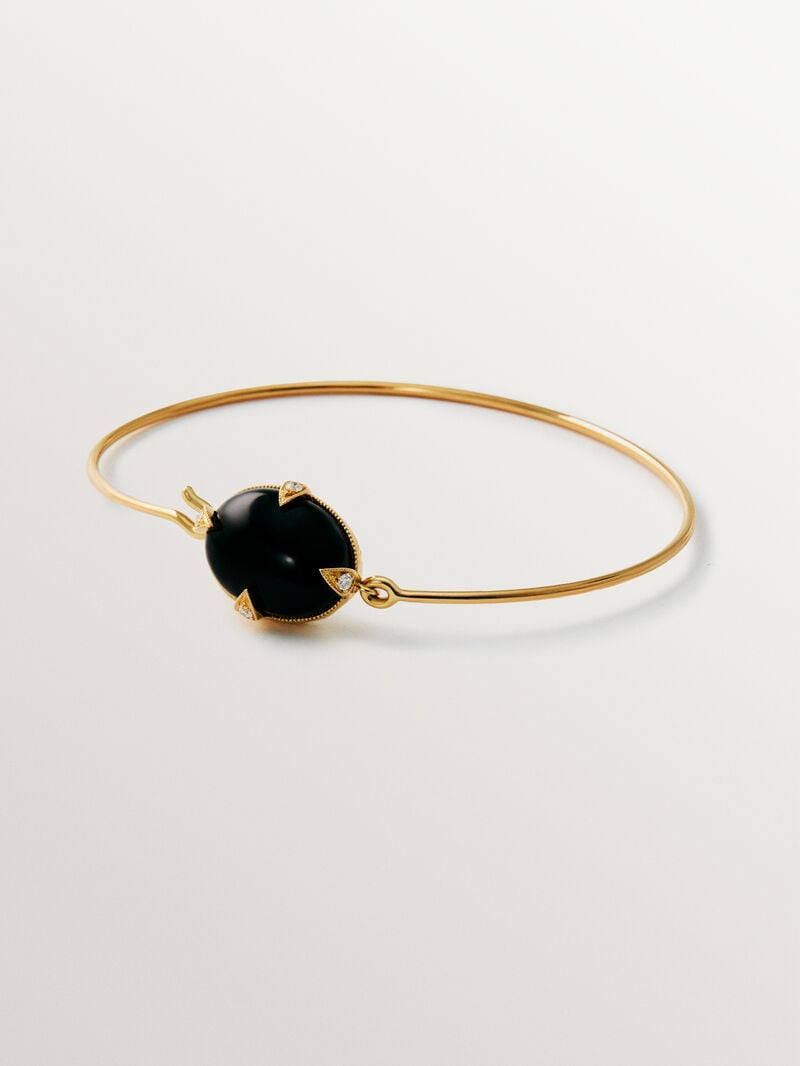 Pulsera de oro amarillo de 18K con ónix negro y diamantes en talla brillante image number 0