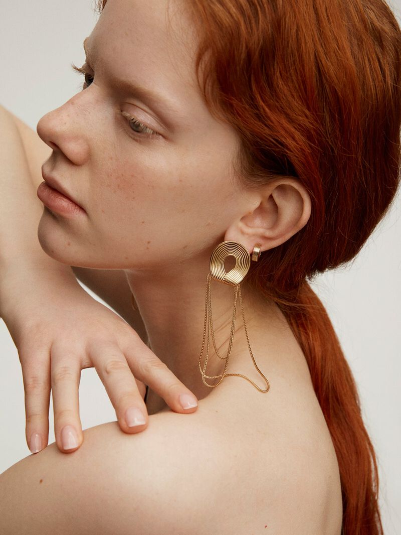 Single wide hoop earring made from 9K yellow gold with texture. image number 4