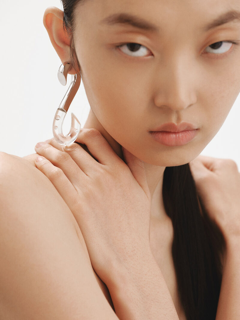 Individual 925 silver earring with zircons suspended in resin image number 3