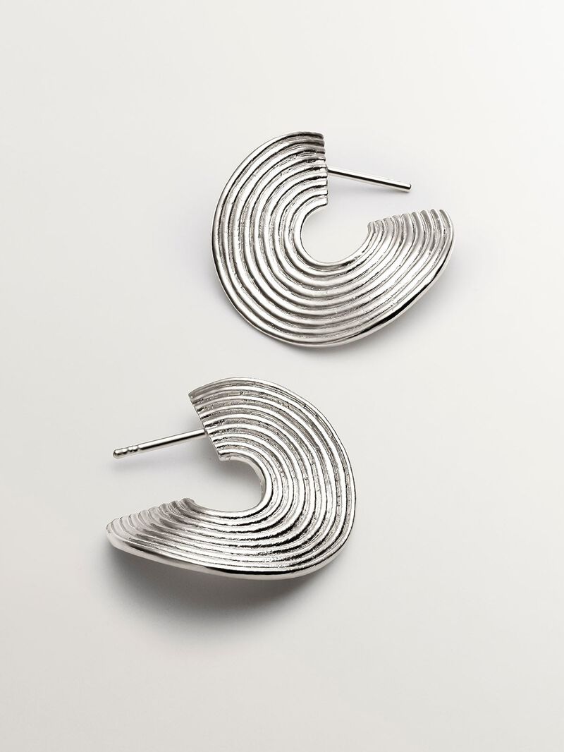 Medium-sized 925 silver hoop earrings with embossed and irregular shape image number 4
