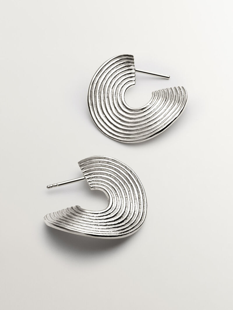 Medium-sized 925 silver hoop earrings with embossed and irregular shape image number 4