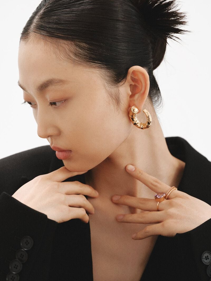 Large hoop earrings made of 925 silver, bathed in 18K yellow gold with a bamboo texture. image number 5