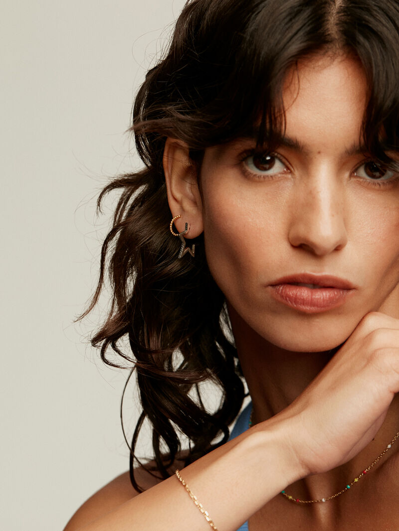 Small hoop earrings made from 925 silver, plated in 18K yellow gold with a ball texture. image number 3