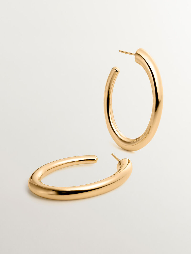Large hoop earrings made of 925 silver, coated in 18K yellow gold, with an oval shape. image number 2