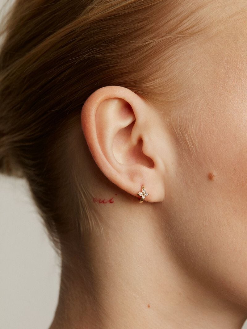 Individual small hoop earring made of 9K yellow gold with a diamond cross image number 1
