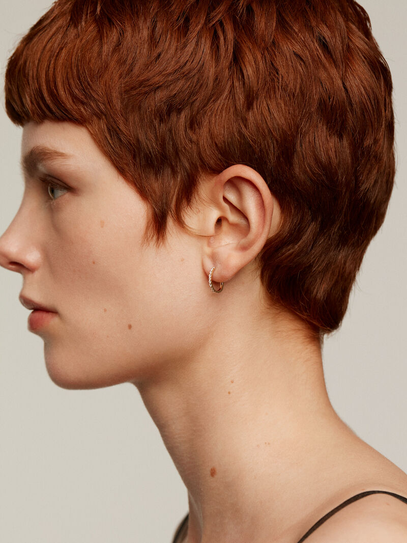 Individual small hoop earring made of 18K yellow gold with 0.20cts diamonds. image number 3