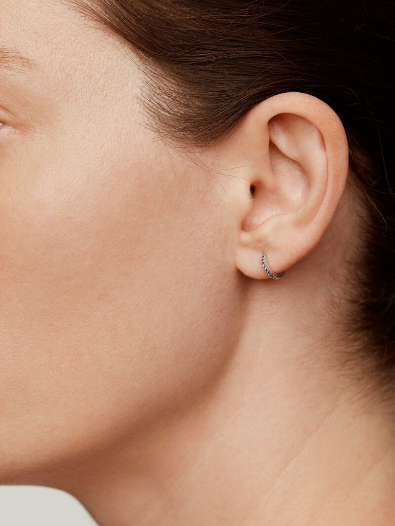 Individual 9K white gold hoop earring with blue sapphires. image number 1