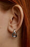 Medium thick wavy hoop earrings in silver, J05134-01