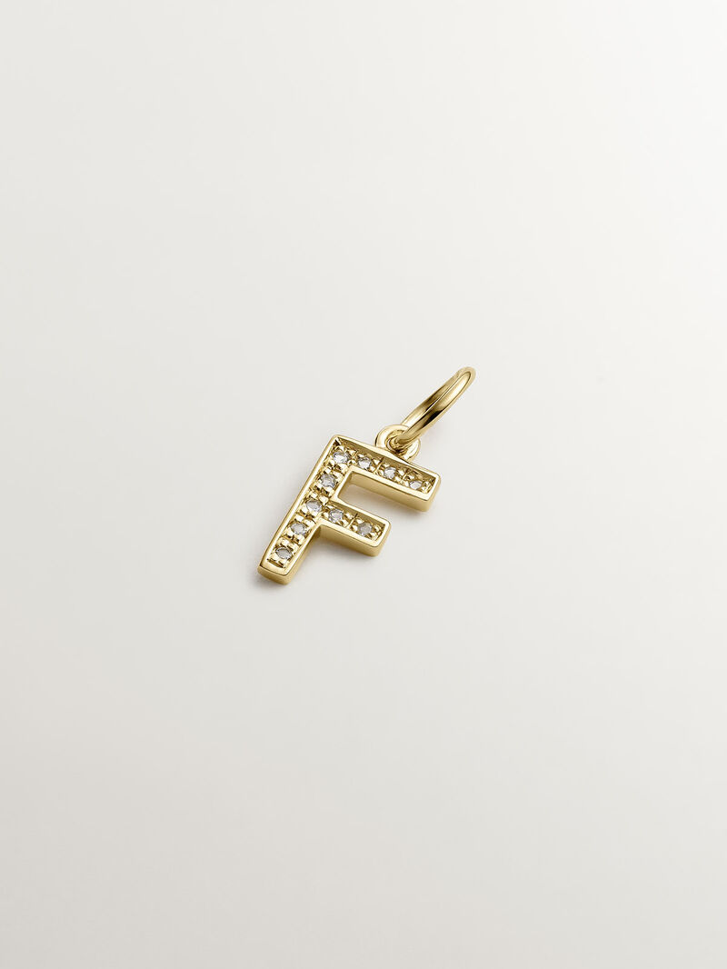 F initial charm made of 925 silver, bathed in 18K yellow gold with white topazes. image number 0