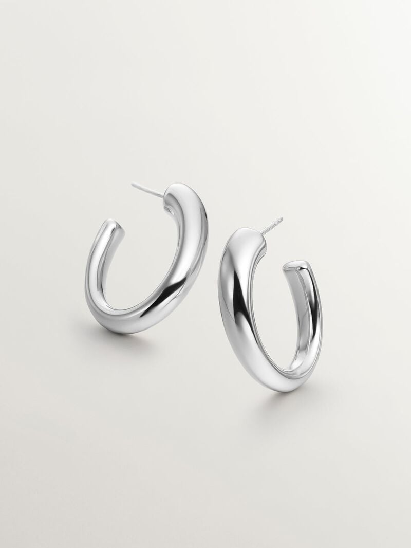 Large and thick 925 silver hoop earrings with an oval shape image number 0