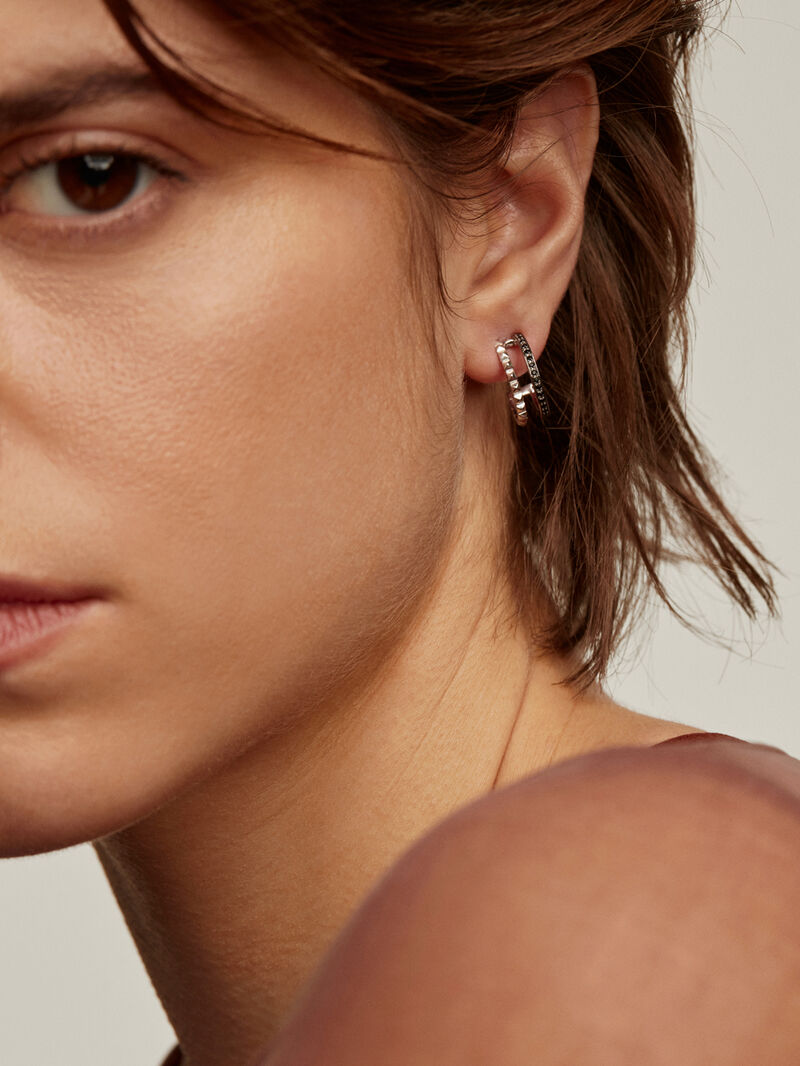 Double hoop earrings made of 925 silver with embossing and black spinels image number 1