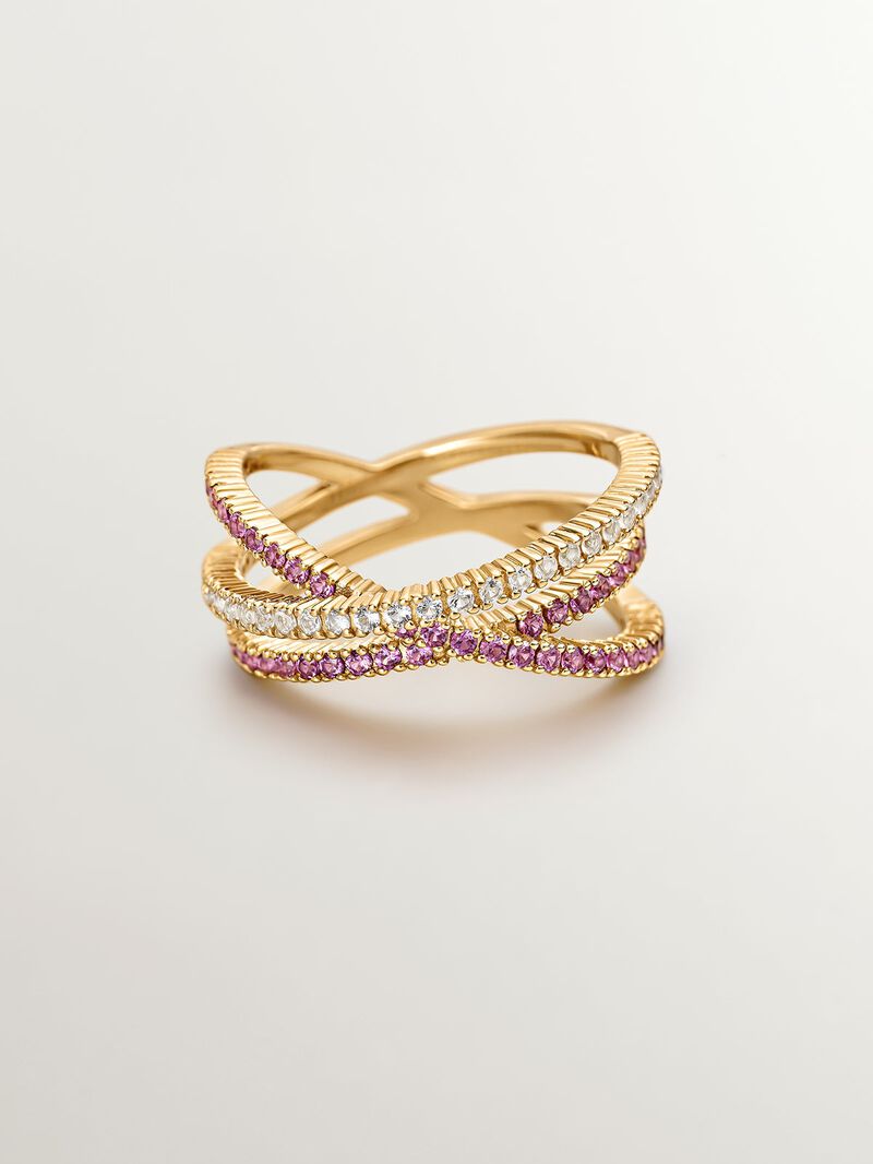 925 Silver triple crossover ring bathed in 18K yellow gold with white topaz and purple rhodolite. image number 2