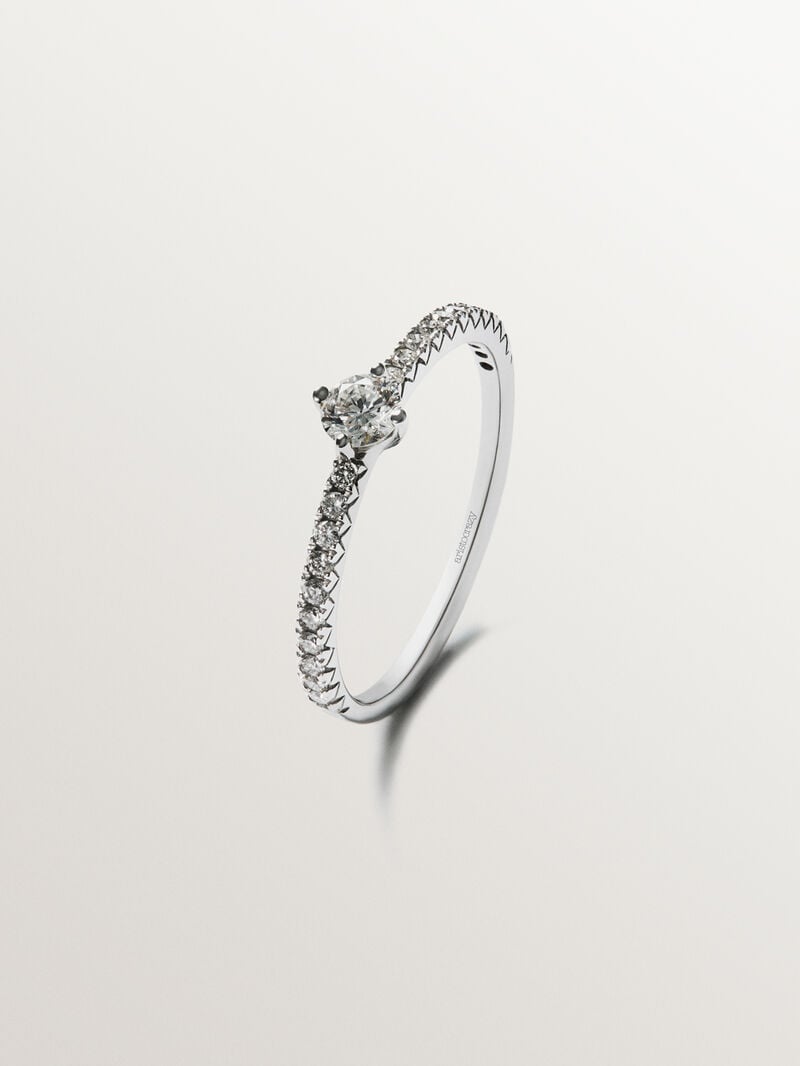 18K white gold ring with diamond arm and central diamond 0.23 cts image number 0
