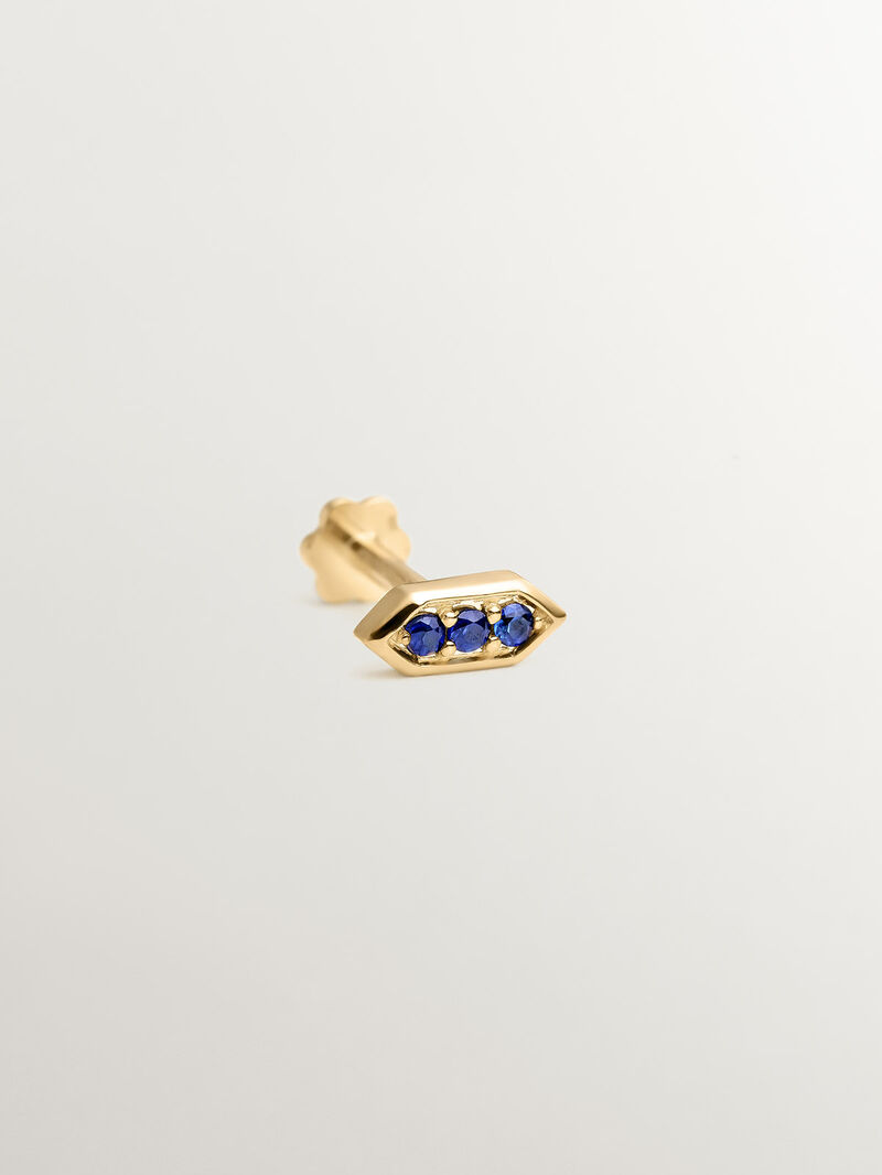 Hexagonal piercing of 18k yellow gold with blue sapphires image number 2
