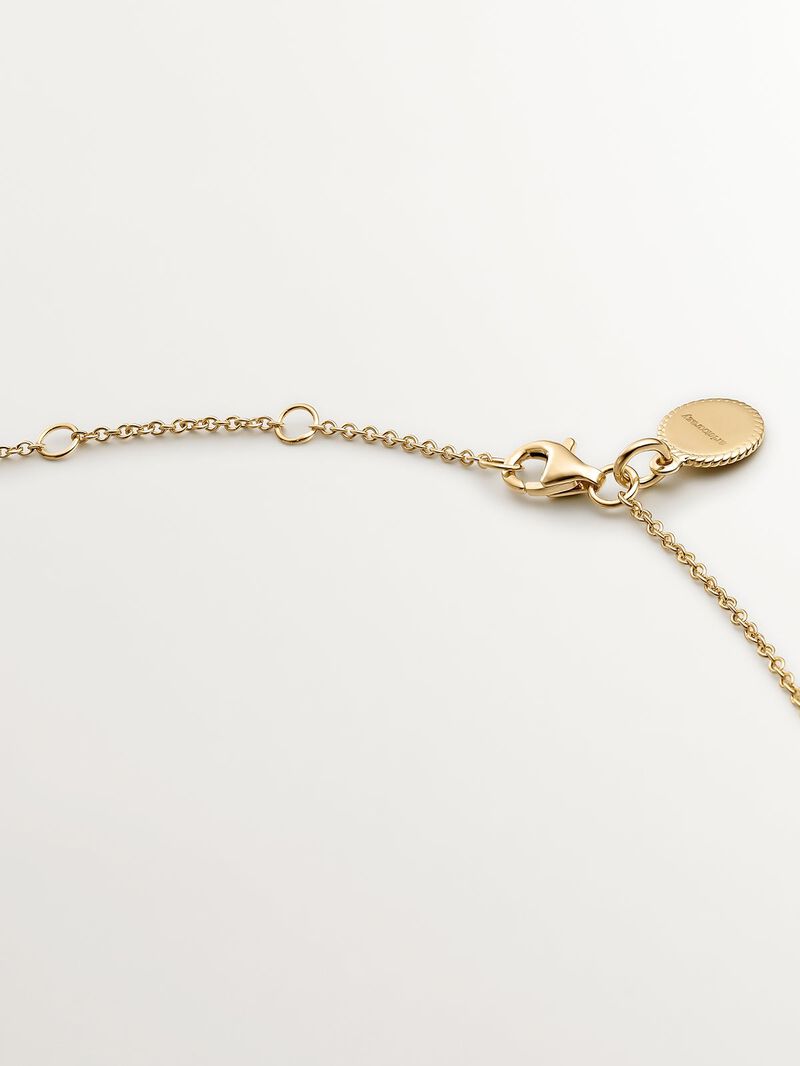925 Silver pendant bathed in 18K yellow gold with sky blue topaz and white sapphires. image number 6