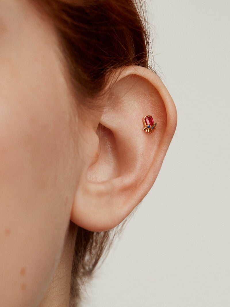 18K Yellow gold piercing with ruby and blue sapphires. image number 1
