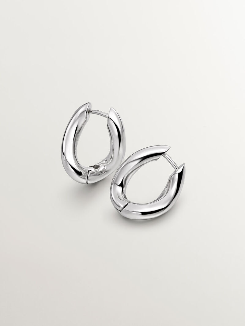 Medium thick 925 silver hoop earrings with a wavy shape. image number 2
