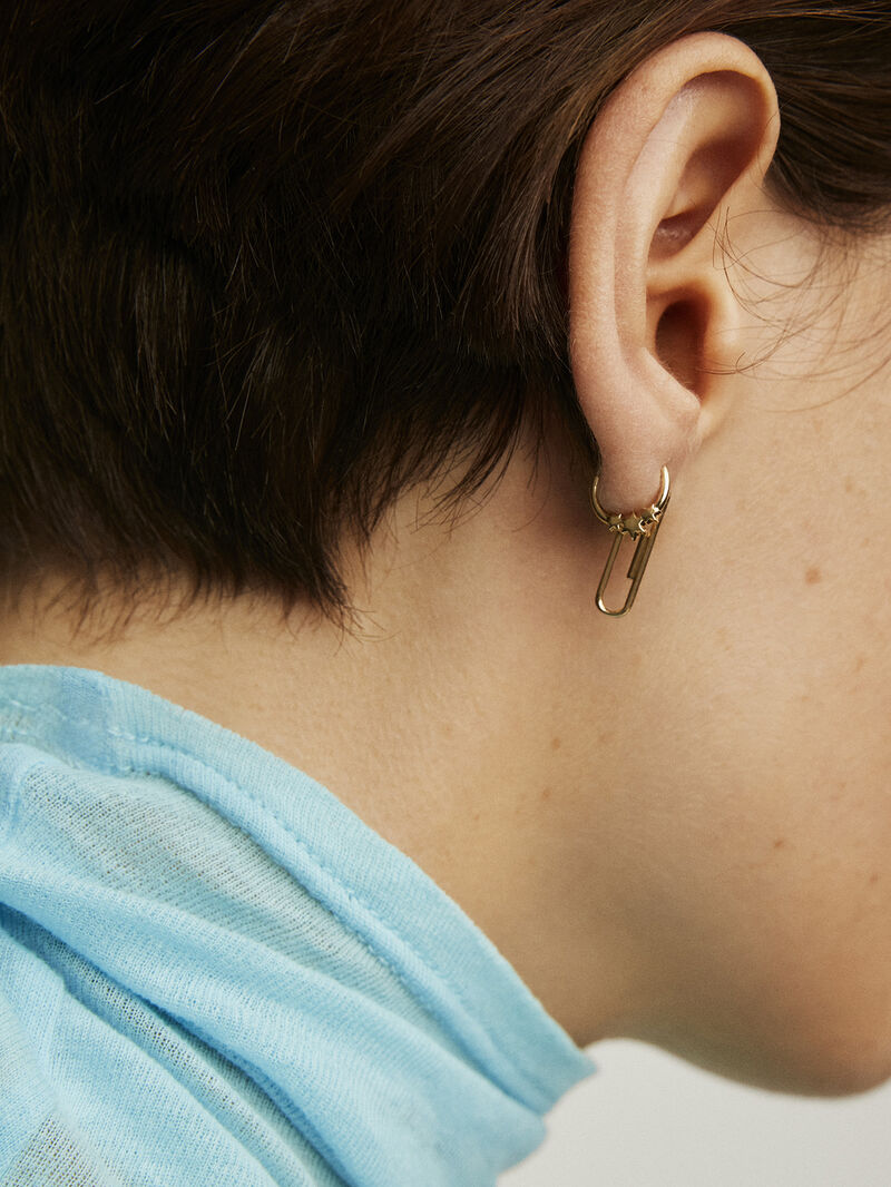 Small 9K yellow gold hoop earring with stars. image number 5