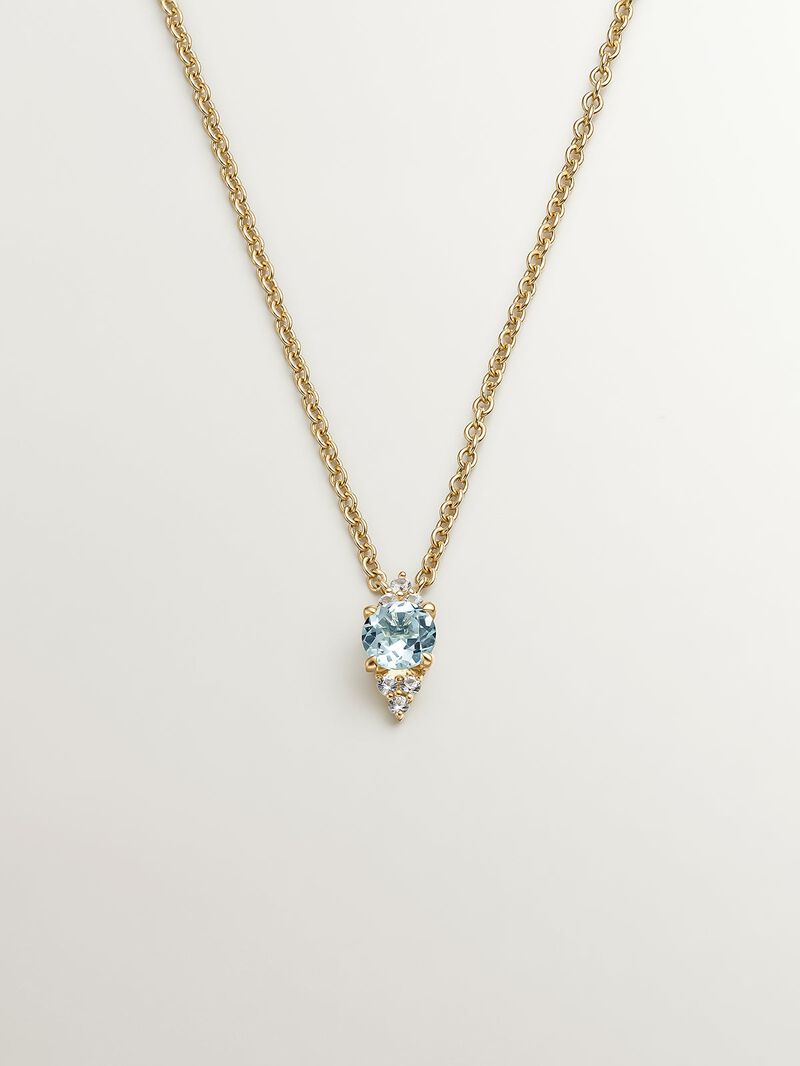 925 Silver pendant bathed in 18K yellow gold with sky blue topaz and white sapphires. image number 0