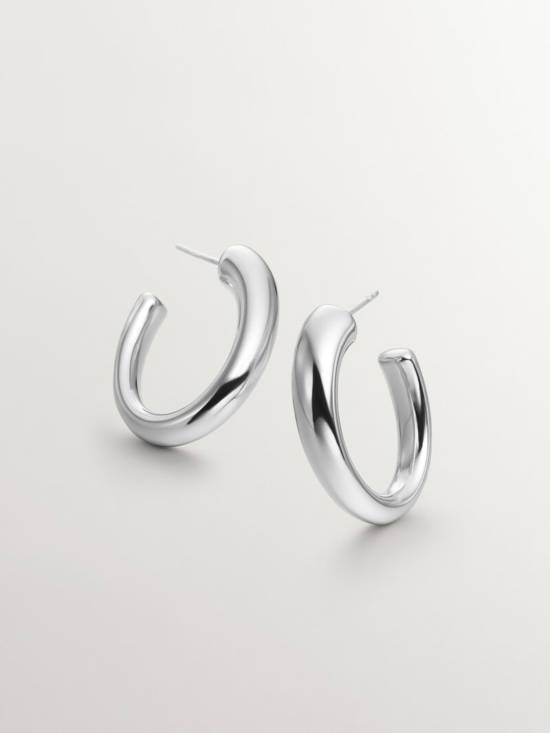 Large and thick 925 silver hoop earrings with an oval shape image number 0