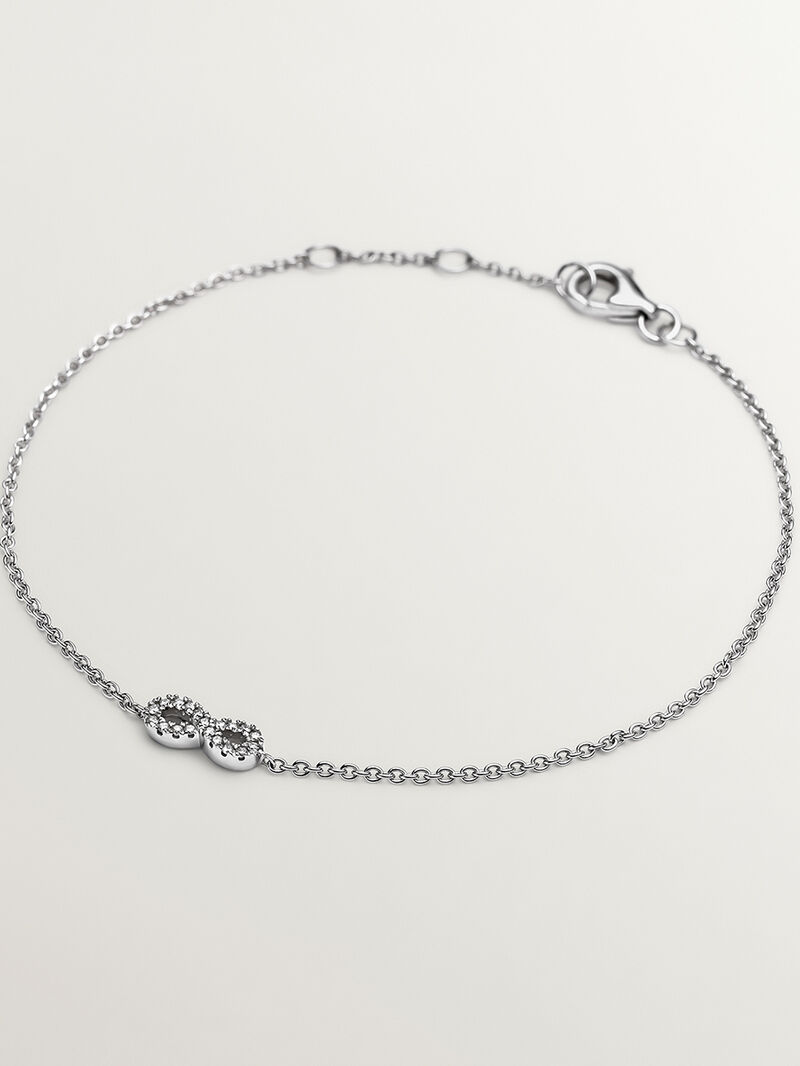 18K white gold bracelet with infinity and diamonds image number 0