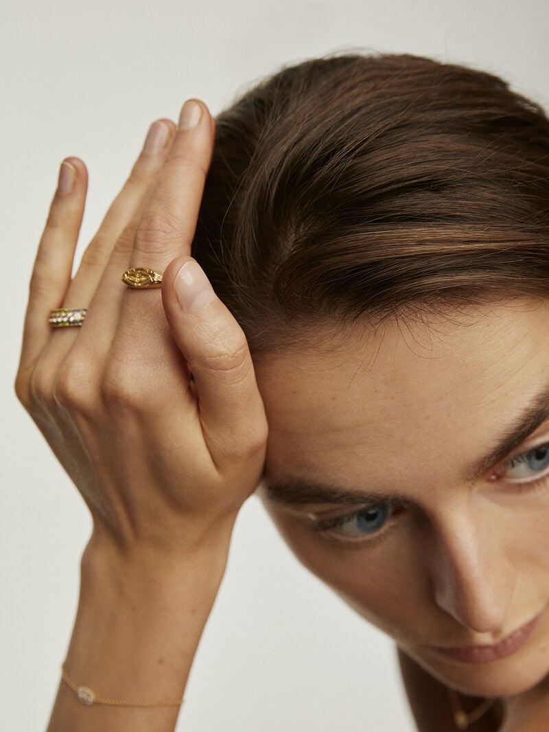 927 Silver seal ring bathed in 18K yellow gold with white topaz and eagle. image number 5