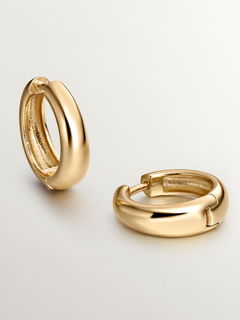 Medium thick hoop earrings made of 925 silver coated in 18K yellow gold. image number 2
