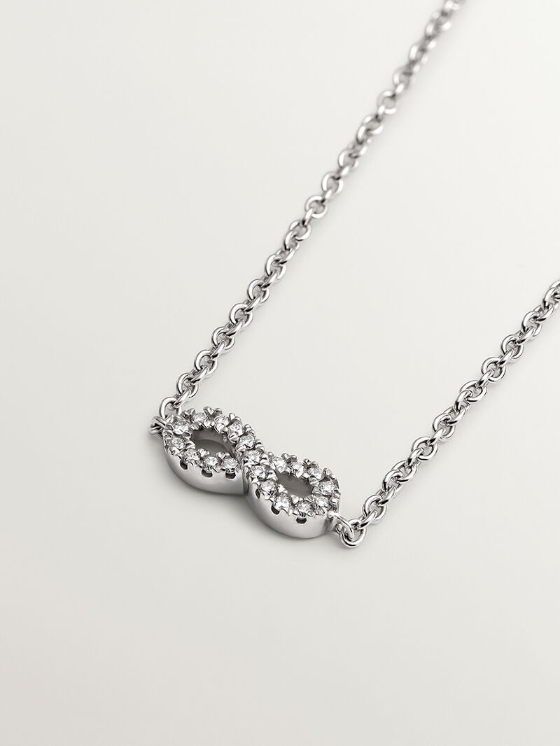 18K white gold bracelet with infinity and diamonds image number 1