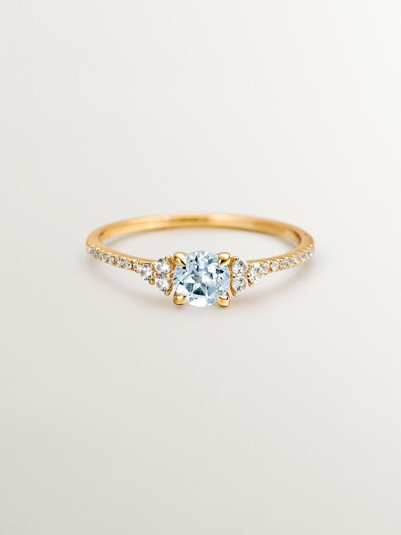925 Silver ring bathed in 18K yellow gold with sky blue topaz and white sapphires. image number 2