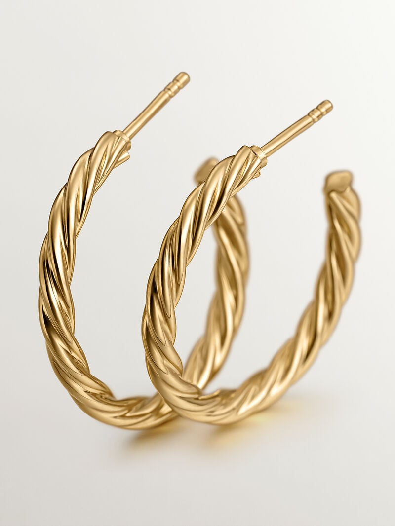 Large hoop earrings made of 925 silver coated in 18K yellow gold with fluted texture. image number 4