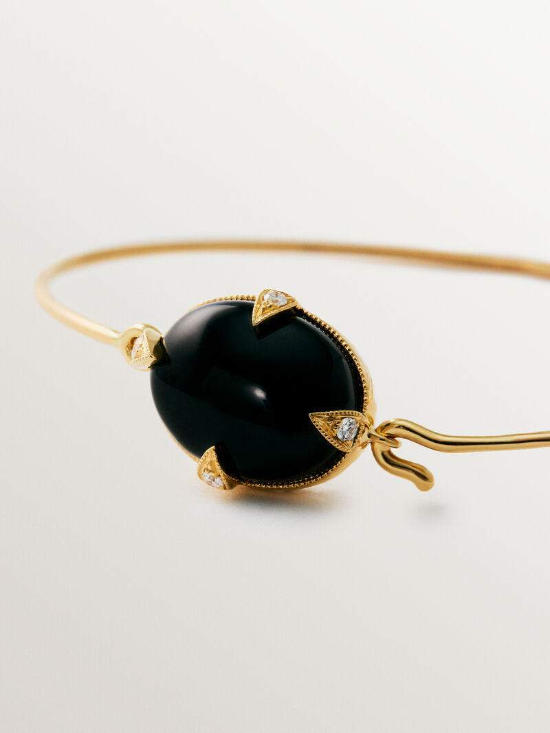 Pulsera de oro amarillo de 18K con ónix negro y diamantes en talla brillante image number 2