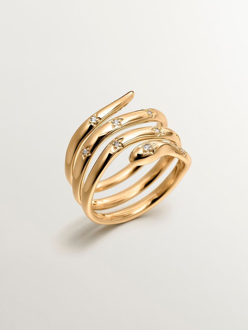 931 Silver triple ring bathed in 18K yellow gold with a snake shape and white topazes. image number 0