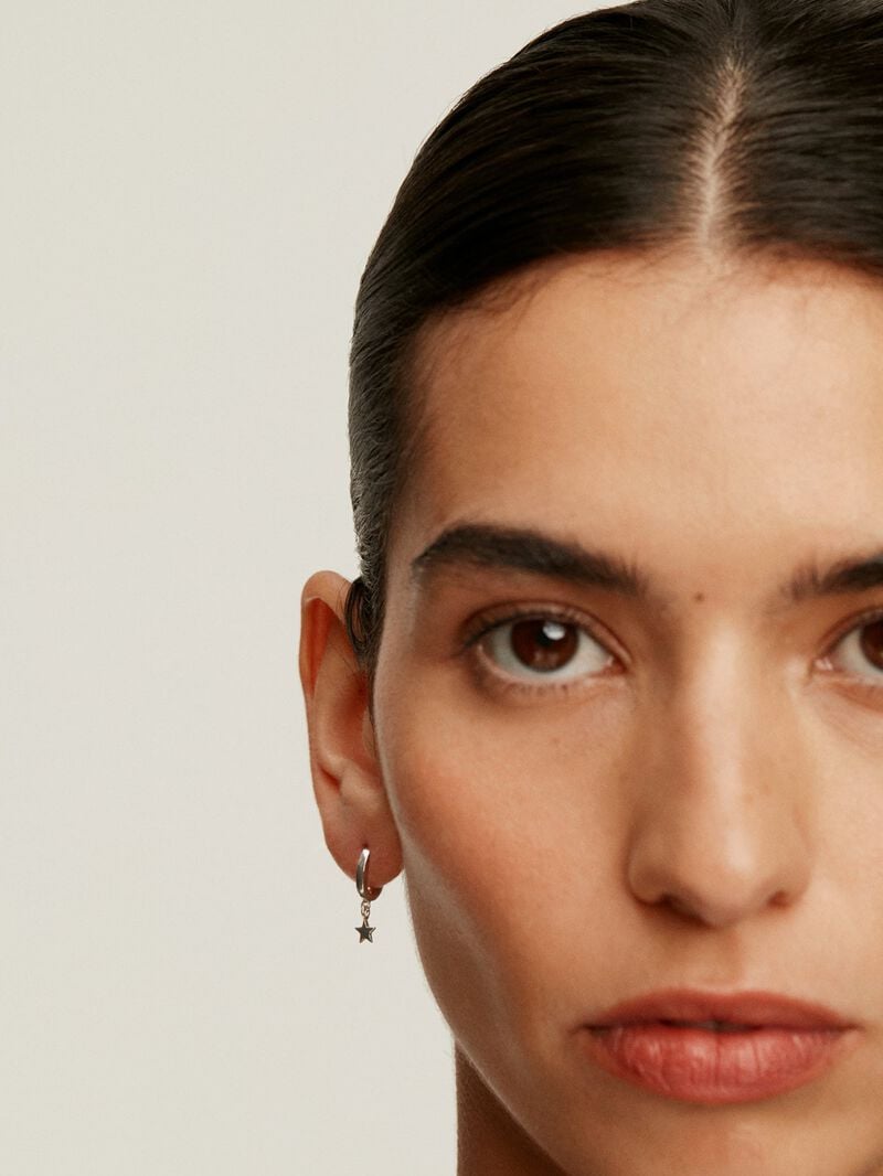 Small 925 silver hoop earrings with star. image number 1