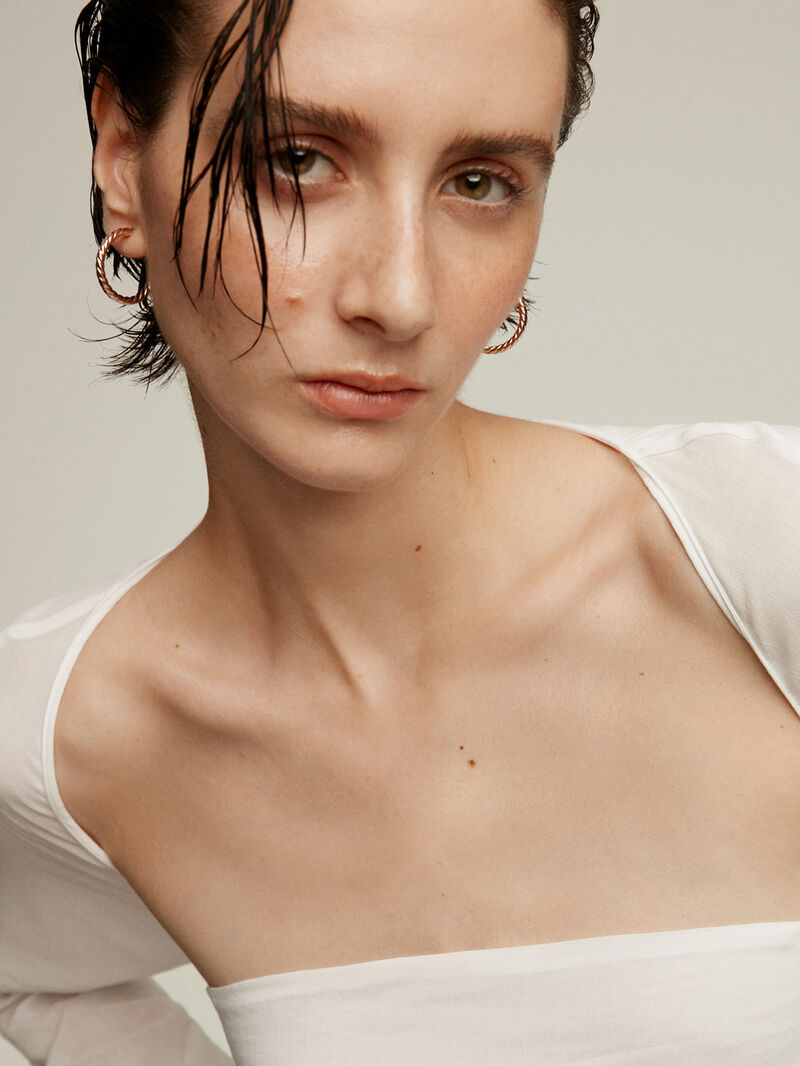 Large hoop earrings made of 925 silver dipped in 18K rose gold with galloned texture image number 1