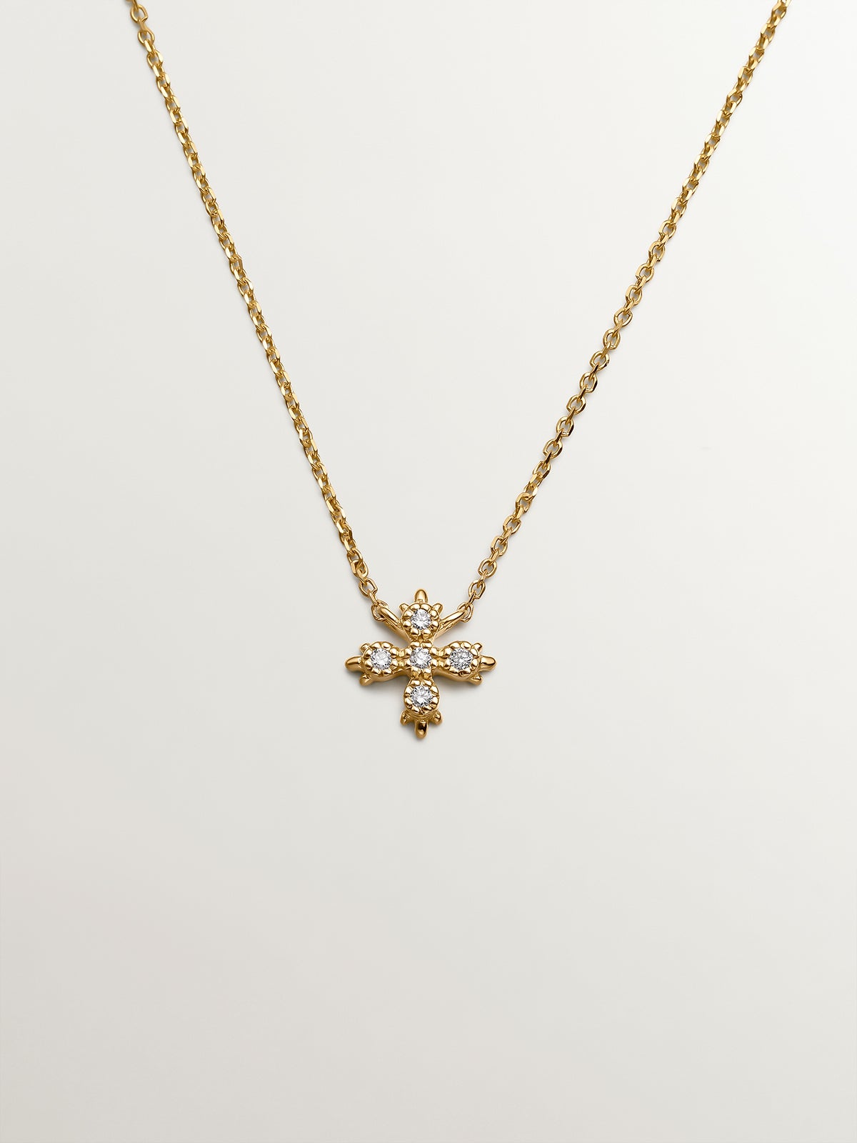 18K yellow gold pendant with diamond cross.