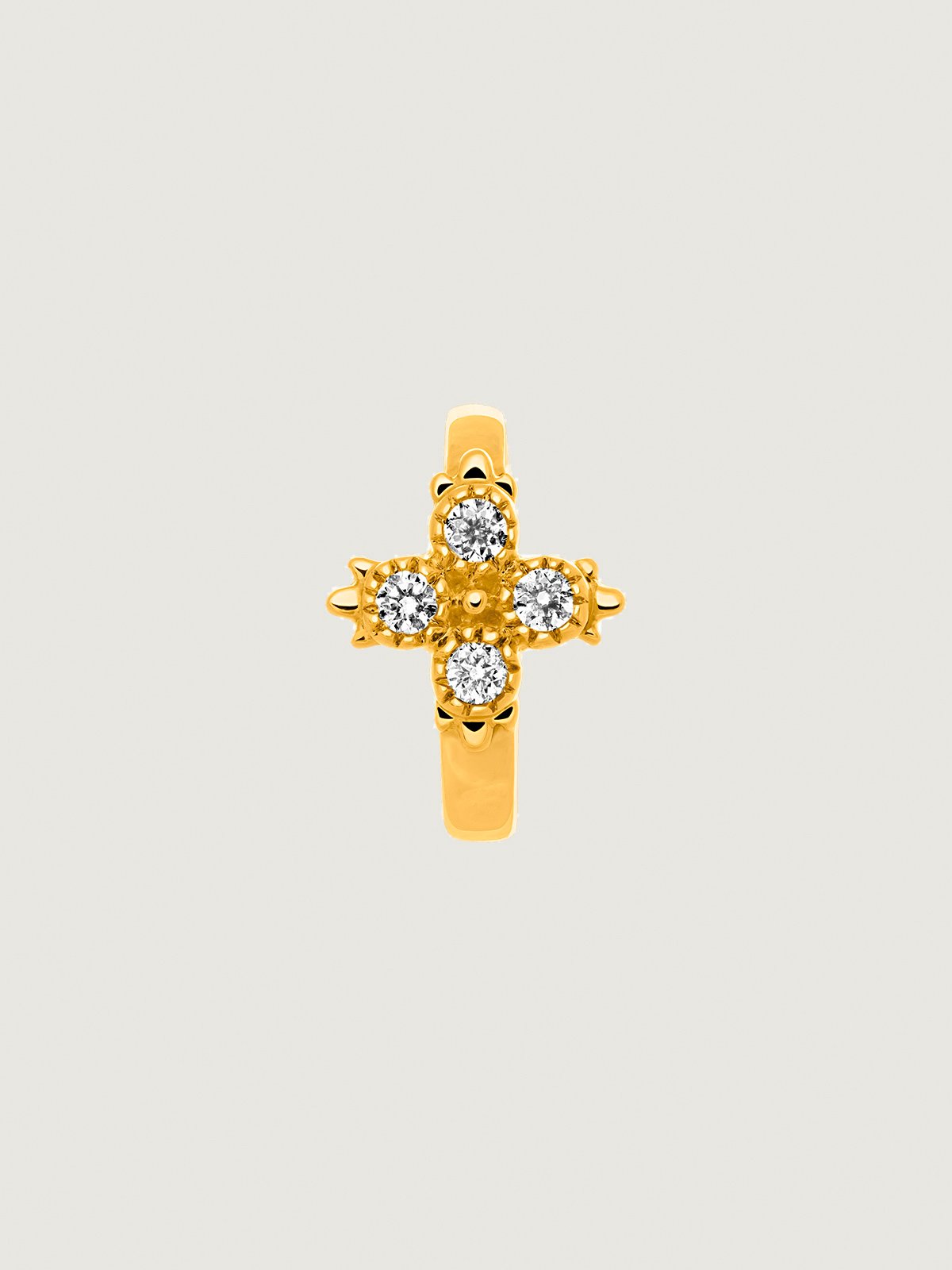 Boucle d'oreille individuelle en petit anneau d'or jaune 9K avec croix de diamants.